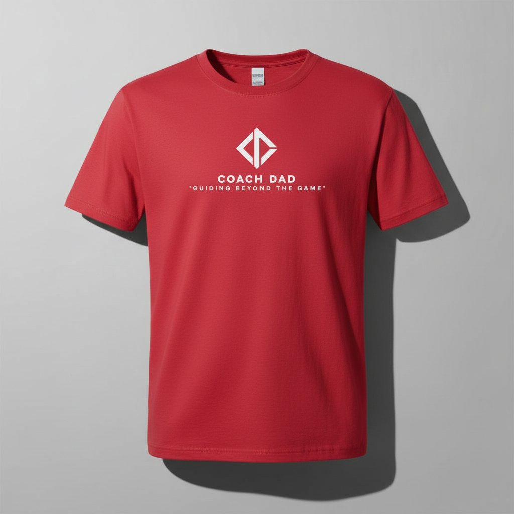 Foundation Tee in victory red with white Coach Dad logo and 'Guiding Beyond The Game' tagline.